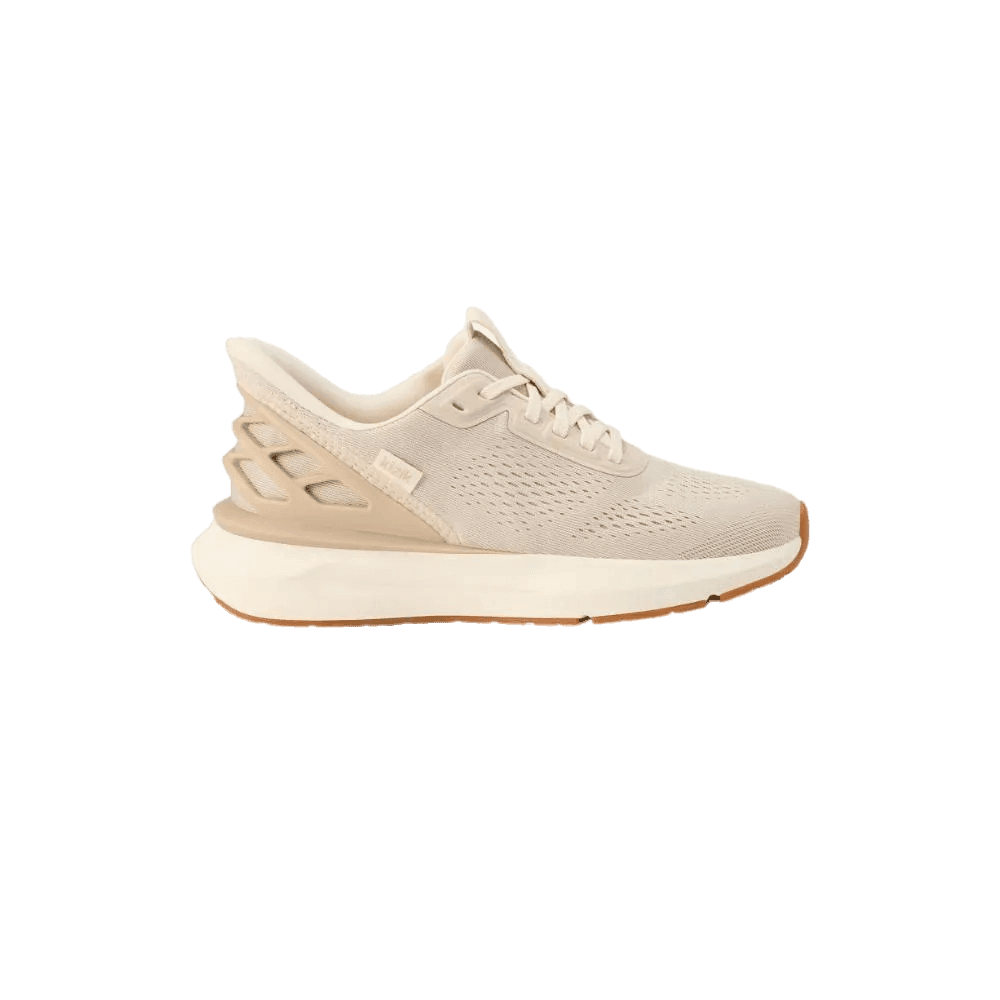 נעלי הספורט Kizik Women's Athens 2 Wide (KIZ150W-OTPR) כוללות גפה עליונה מבד רשת בצבע בז', סגירת שרוכים, סוליה לבנה עבה וסוליה חיצונית בצבע חום בהיר. מוצגות בפרופיל צדדי על רקע לבן חלק. מותג: Kizik.