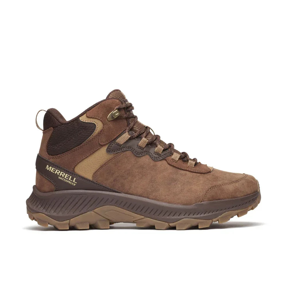 מגף Merrell SPEED STRIKE 2 LTR MID WP/MOLE MEN J038073 מבית Merrell כולל סוליה מחוספסת, שרוכים חומים ותמיכה בקרסול, מוצג בפרופיל צדדי על רקע לבן חלק.