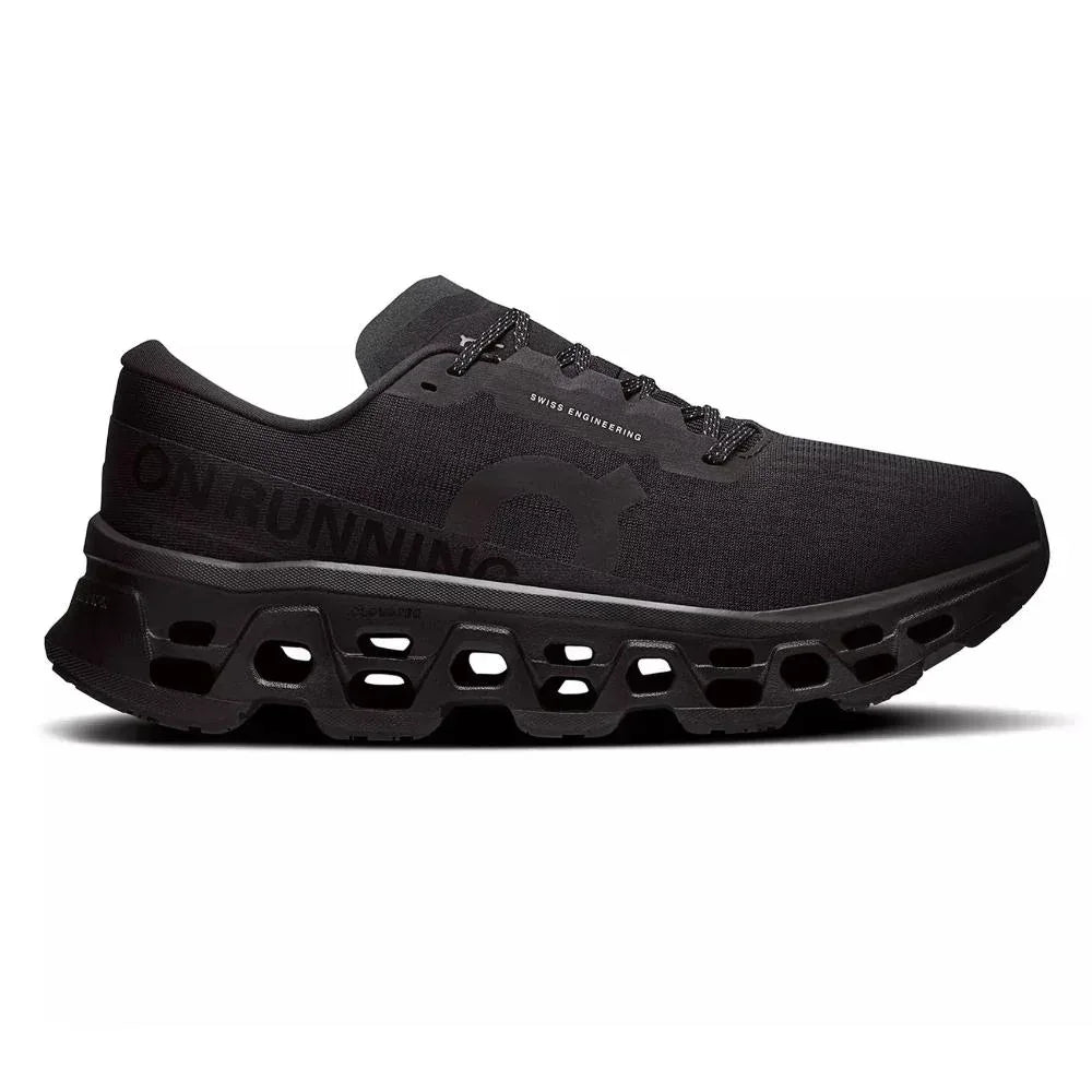 On Cloud Cloudmonster 3 Black (3MG10051043) הוא נעל ריצה אתלטית בצבע שחור מבית On Cloud, עם גפה עליונה מרשת נושמת וסוליה מרופדת ייחודית עם חלקים חלולים, כפי שנראה בתמונה הצדדית.