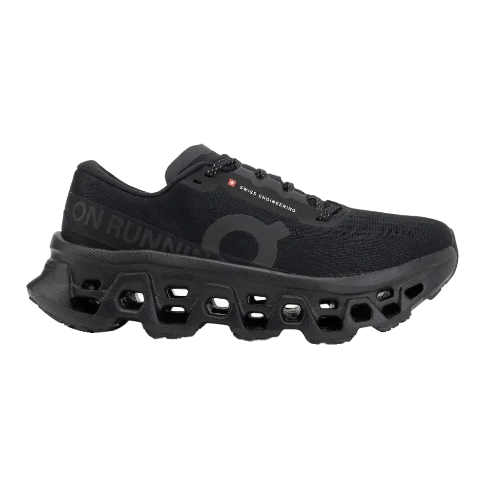 דגם On Cloud 3WG10031043 Cloudmonster 3 Black מבית On Cloud הוא נעל ספורט שחורה עם סוליה עבה ומחולקת ולוגו "ON RUNNING" בצד.