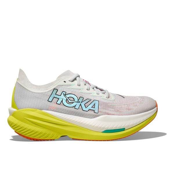 מבט מהצד של נעל הריצה Hoka 1155119/FCT MACH X2 הכוללת חלק עליון אפור, לוגו תכלת וסוליה עבה בצהוב ולבן.