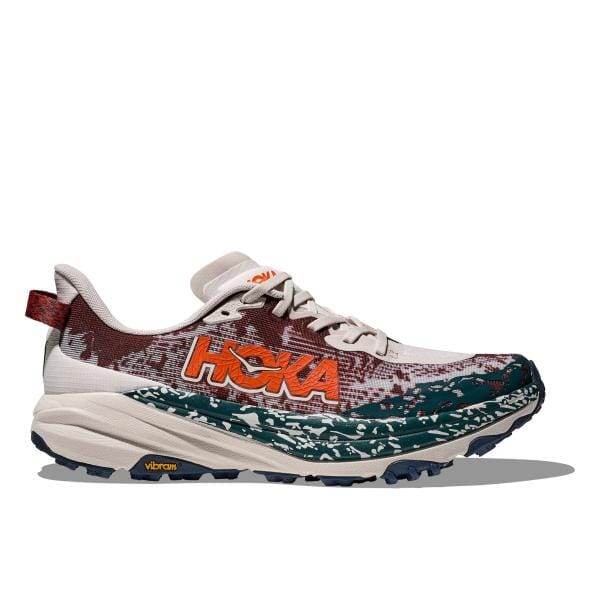 Hoka SPEEDGOAT 6 (דגם 1147791/PTYB) היא נעל ריצת שבילים בעיצוב רב צבעים, עם הלוגו "HOKA" בצד. יש לו סוליה ביניים עבה ומרופדת וסוליה מעוצבת למשיכה אופטימלית.