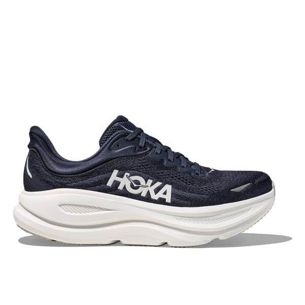 Hoka 1162011/VYN BONDI 9 היא נעל ריצה נייבי עם סוליה לבנה, המציגה את הלוגו של Hoka בצד.