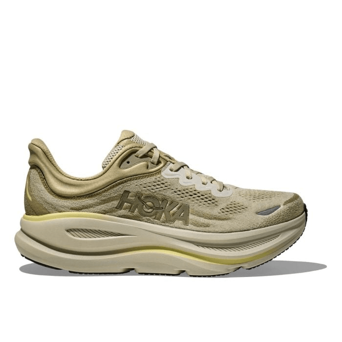 נעלי ריצה הוקה בונדי 9 לגברים Hoka BONDI 9 1162011/GSSL בז’, עם סוליה עבה לשיכוך מירבי ועליונית רשת נושמת, מוצגים בפרופיל מול רקע לבן.