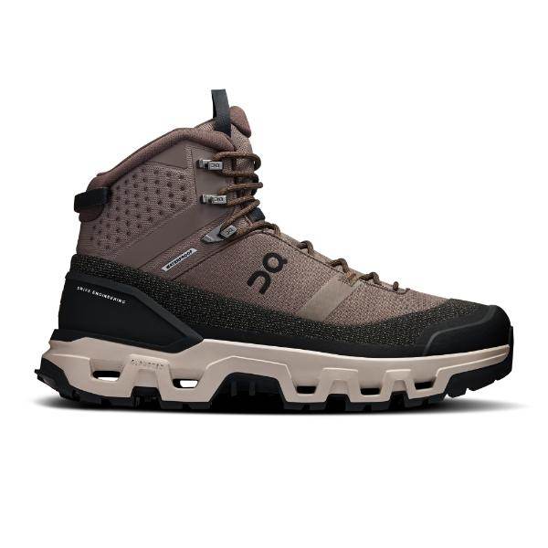 נעלי On Cloud נעלי און קלאוד רוק טרק לגברים Cloudrock Trek WP 1 Ash/Fog 3ME30103319 הן נעלי טיולים גבוהות בצבע חום ושחור עם סוליה מחוספסת, שרוכים בחלק הקדמי ולוגו On בצד.
