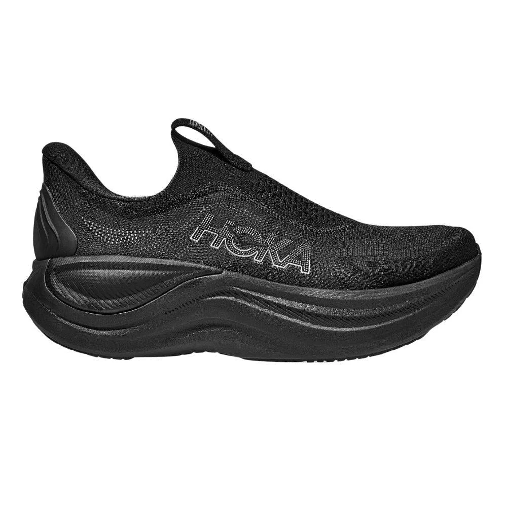 נעלי ריצה ללא שרוכים הוקה סקייורד לנשים Hoka 1168877/BBLC, בצבע שחור עם סוליה עבה ועליונית רשת, כולל לוגו Hoka בצד — נוחות מירבית בכל צעד.