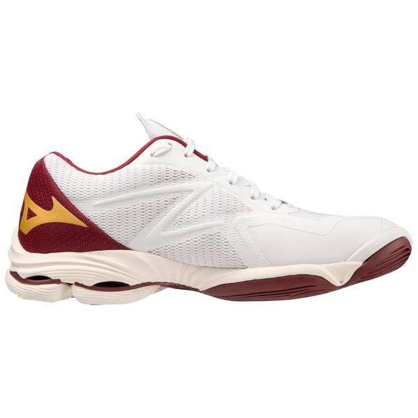 Mizuno V1GC220045 WAVE LIGHTNING Z7 היא נעל אתלטית לבנה עם הדגשים אדומים וצהובים, הכוללת חלק עליון מרשת וסוליה מרופדת.