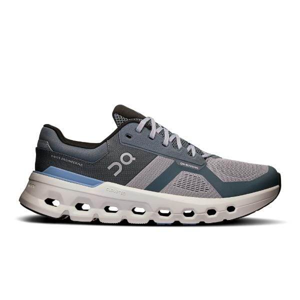 ה-On Cloudrunner 2 (Aloy/Chambray) של On Cloud היא נעל ספורט בצבע אפור וכחול עם סוליה לבנה, המתהדרת בעיצוב מודרני וסגירת שרוכים.