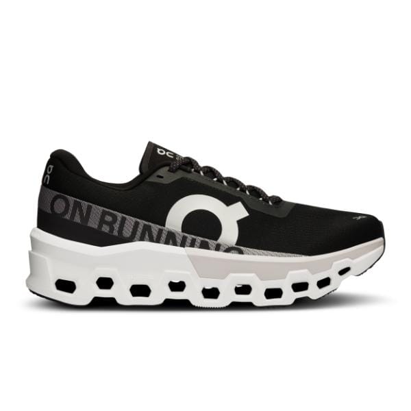 נעל ריצה בשחור ולבן של On Cloud עם המילה "Cloudmonster 2".